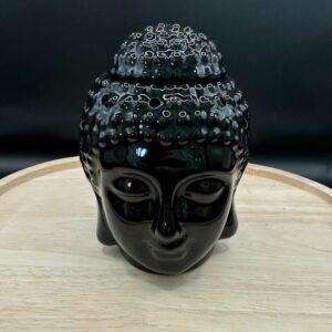 Brûleur d’arômes Dhyana noir en forme de tête de Bouddha, vue de face sur fond noir